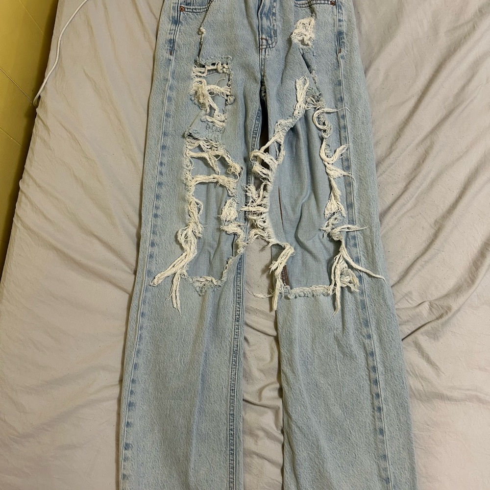 Distressed Light Blue Denim Jeans
